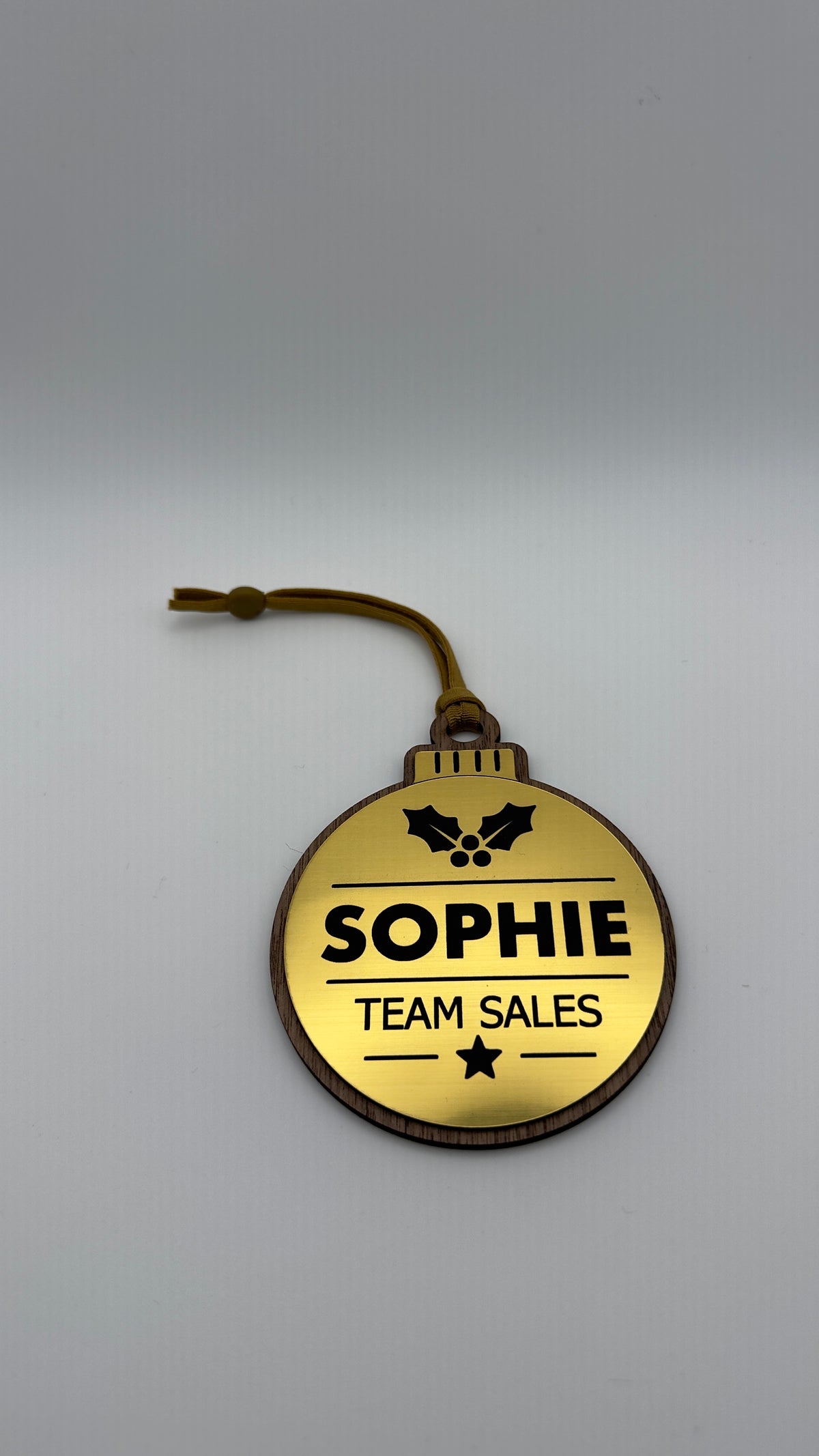 Actual Gold Design 1 bauble with Sophie and Team Sales example personalisation