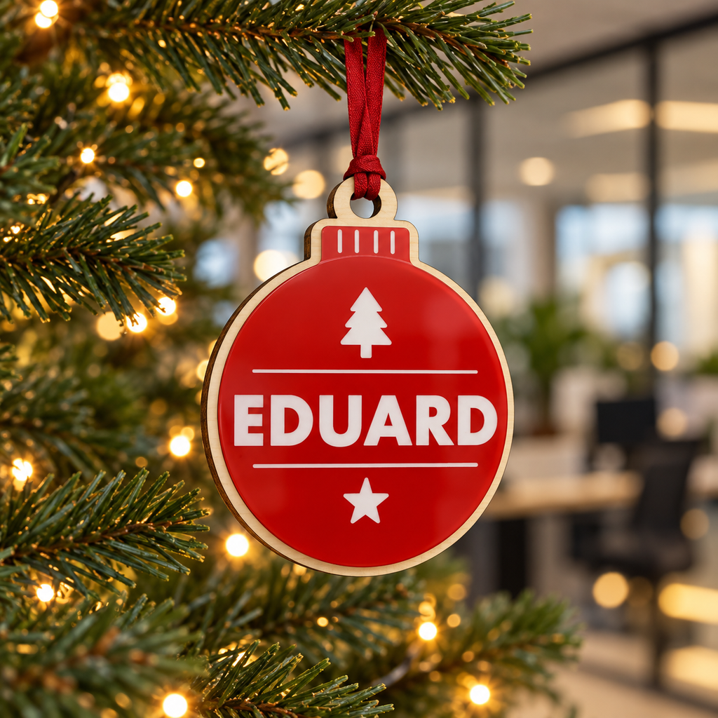 Red personalised Christmas bauble Design 2, lifestyle photograph; decorative props not included. Hanging strip colour varies.