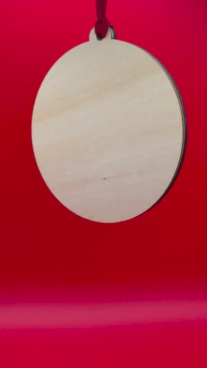 Spinning layered bauble — Santa design with sample couple names